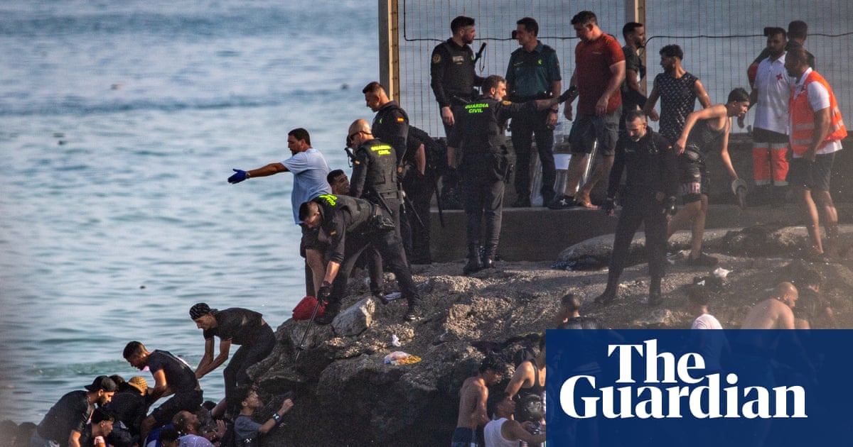 At least 43 people die as tens of thousands cross to Spanish enclave of Ceuta from Morocco