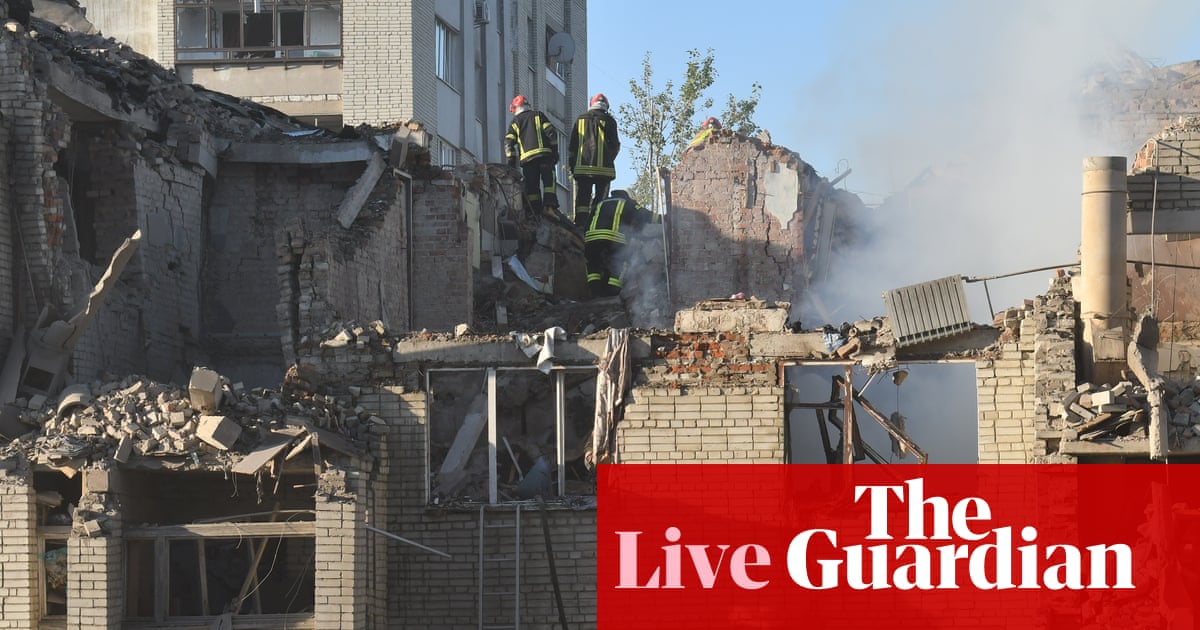 First responders operate at a residential building partially destroyed as a result of Russian missile strikes in the western Ukrainian city of Lviv.