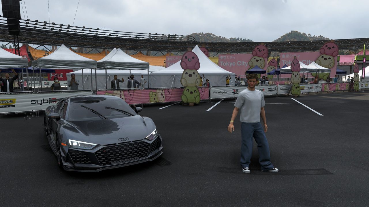 The new Festival Playlist update is well underway with the Horizon Mascot Party in Forza Horizon 6, and as with the usual weekly updates, we’ve got a new photo challenge. This one involves finding Mascot City’s Tokyo City Dango area and it’ll give you both the Dango Outfit, plus progress towards the Summer Season, inching you closer to the Exomotive Exocet Sport and the Datsun 2000 Roadster. Forza Horizon 6 Mascot City’s Tokyo City Dango area locationYou can find the Tokyo City Dango area in the big Mascot Party stadium in the south of Shimanoyama (Image credit: Playground Games)This week’s photo challenge is super easy, you just need to head to the giant stadium in the south of the Shimanoyama region, on the west side of the map. This stadium is marked as the Horizon Mascot Party location, though it’s somewhat confusing that the instructions direct us to Tokyo City, when it’s not in that region at all.Once you arrive, park anywhere inside, and follow these instructions to get your driver out of their car:Press up on the D-pad to activate photo mode when your car is stationaryPress Y for effectsScroll down to characterCycle along until they appear outside your carPress Y to close the effects menuTake your snapThis will earn you the Dango Outfit plus some progress towards those special Summer Season cars. Make sure to also complete the new collectible and weekly challenge if you want to maximise your point gains.Forza Horizon 6 car list: All the rides you can collect.Forza Horizon 6 best cars: What to buy and tune.Forza Horizon 6 Treasure Cars: Skip the clues.Forza Horizon 6 Barn Finds: Track down these relics.Forza Horizon 6 review: What we think.